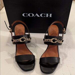 Coach Sz 8.5 Black Sandals 3" heel, with Gold Chain 'C' Accent. Like new in box